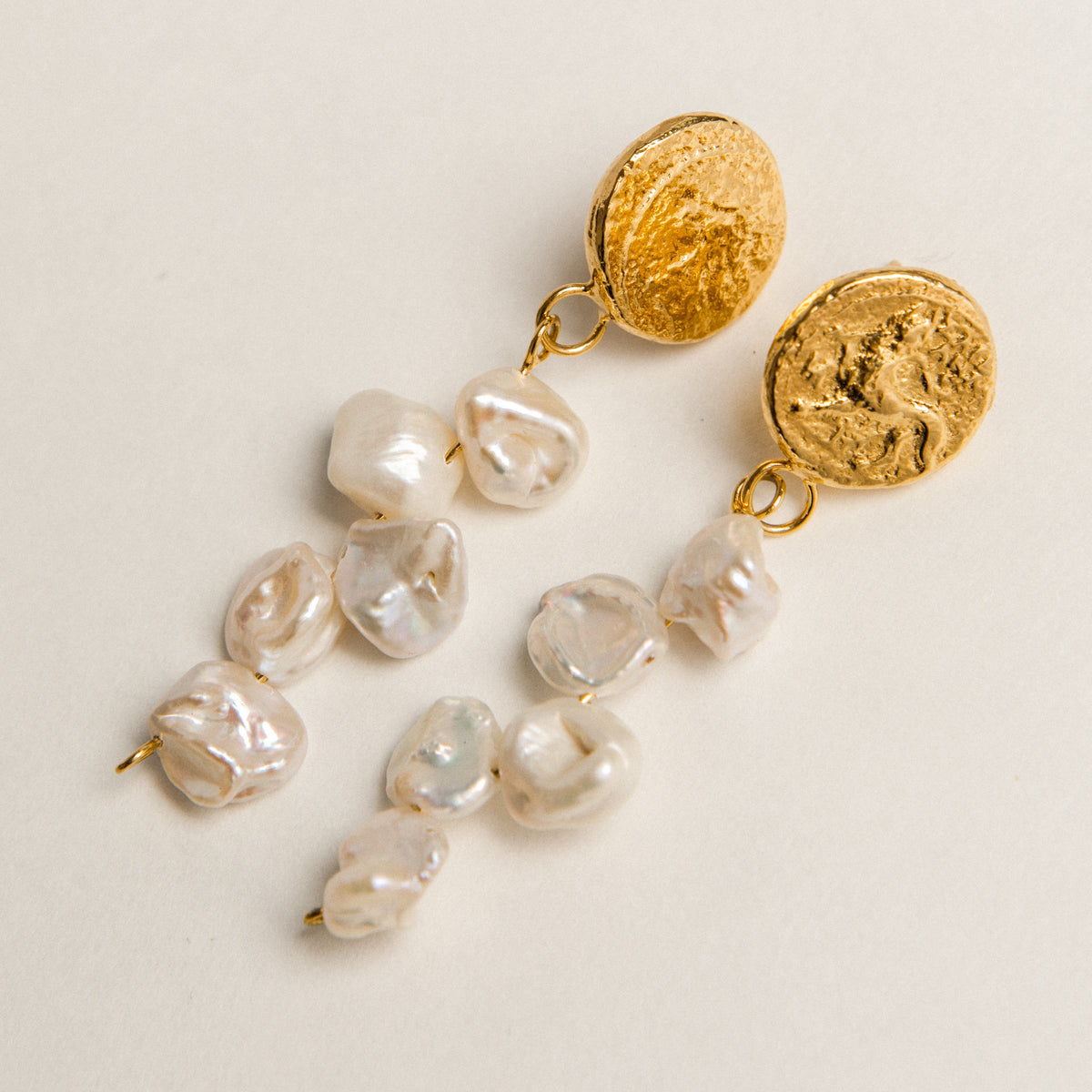 PAMELA CARD Guardians Of Us Earrings Jewelry available to buy online from RENU Laser & Skin in Mill Bay, BC on Vancouver Island